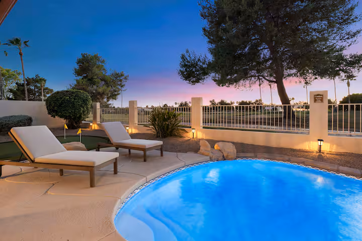 Resort style backyard with heated pool during winter months